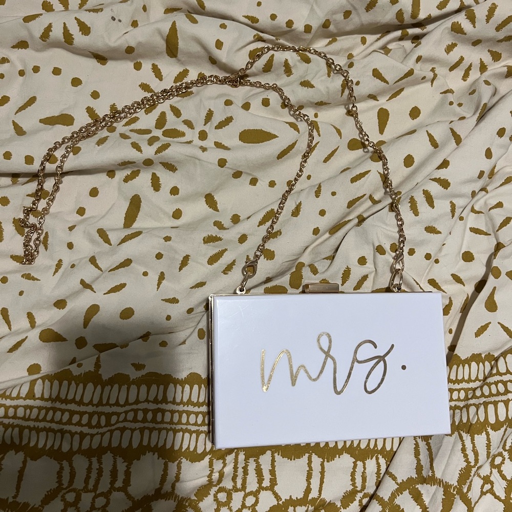 Plastic MRS. bag with gold chain.